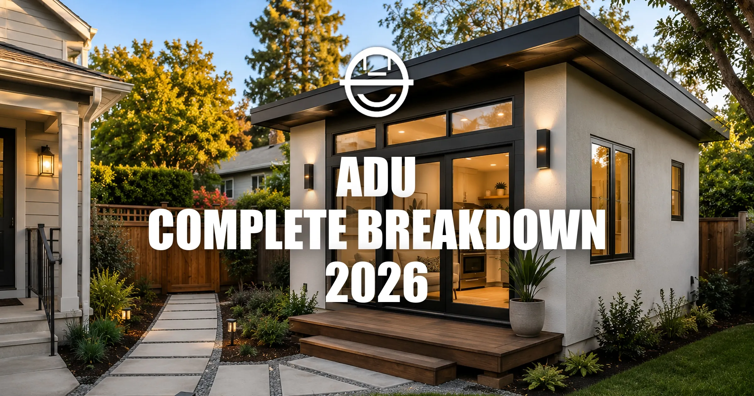 Modern detached ADU in a landscaped backyard behind a suburban home, showcasing contemporary design and residential property value enhancement.